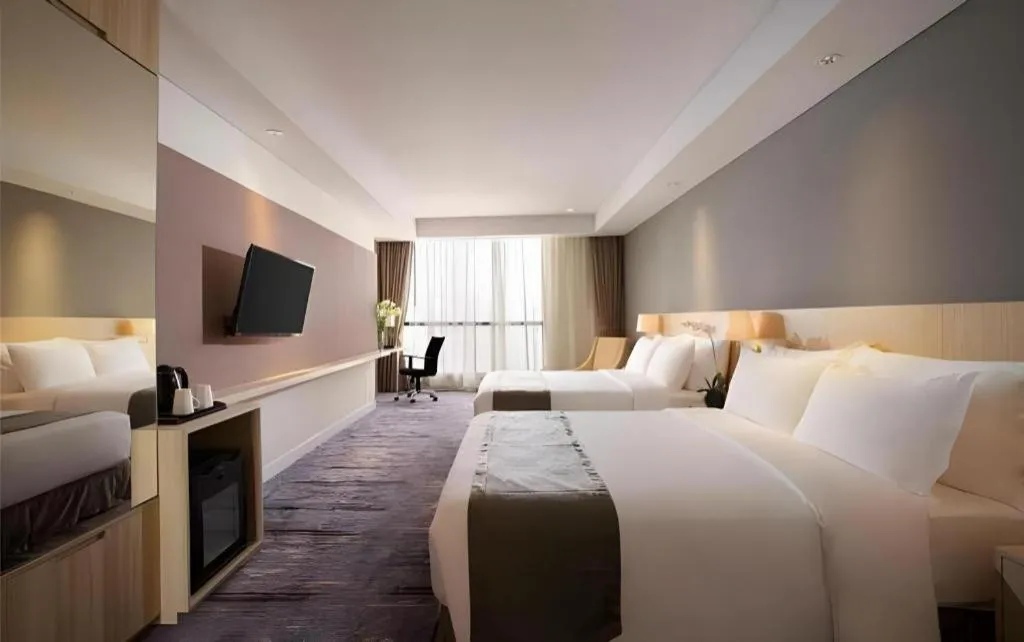 Bed in Hotel Grandhika Pemuda