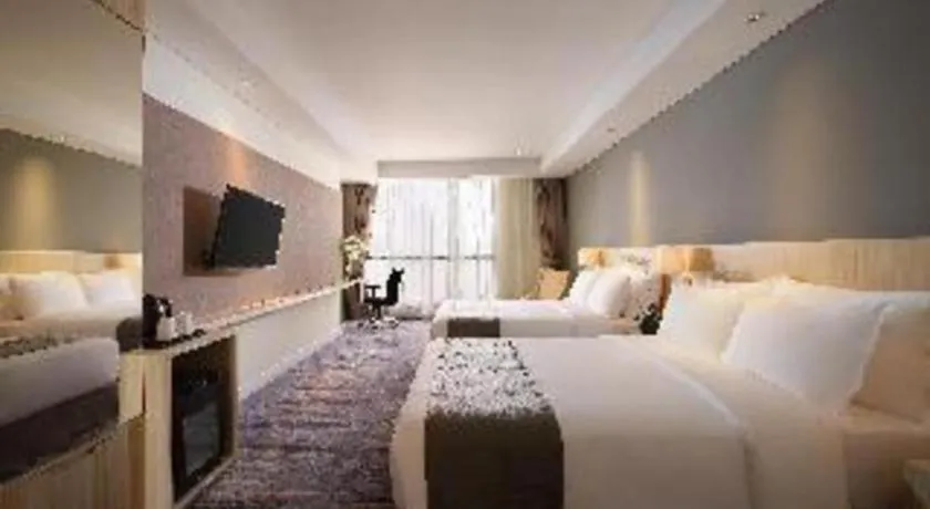 Bed in Hotel Grandhika Pemuda