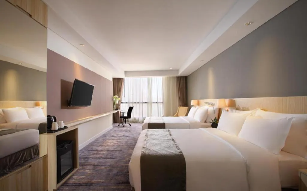 Bed in Hotel Grandhika Pemuda