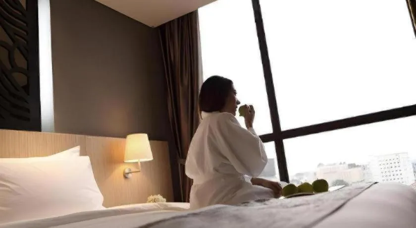 Bed in Hotel Grandhika Pemuda