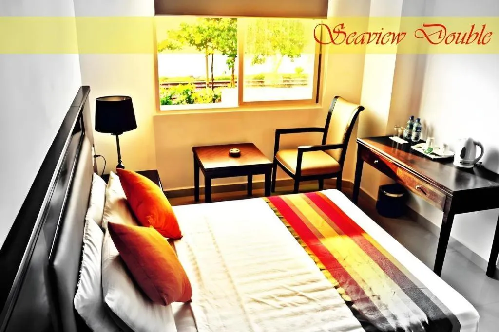 Bed in Sai Sea City Hotel