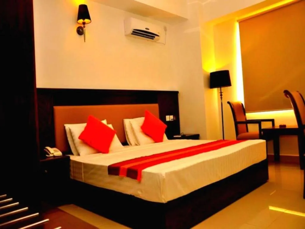 Bed in Sai Sea City Hotel