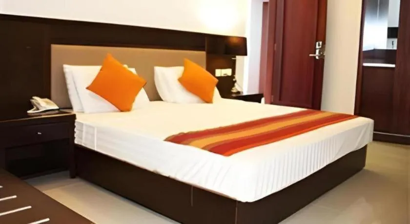 Bed in Sai Sea City Hotel