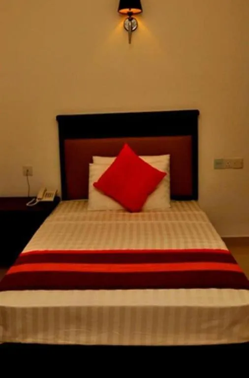 Bed in Sai Sea City Hotel