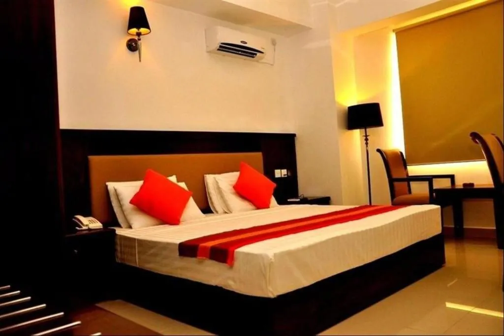 Bed in Sai Sea City Hotel