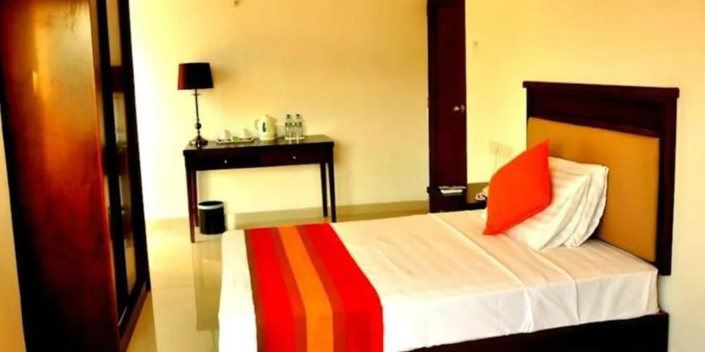 Bed in Sai Sea City Hotel