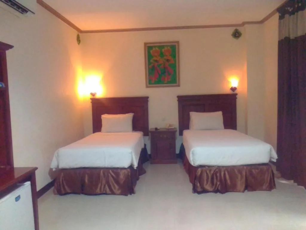 Bed in Yusro Hotel Restaurant & Convention