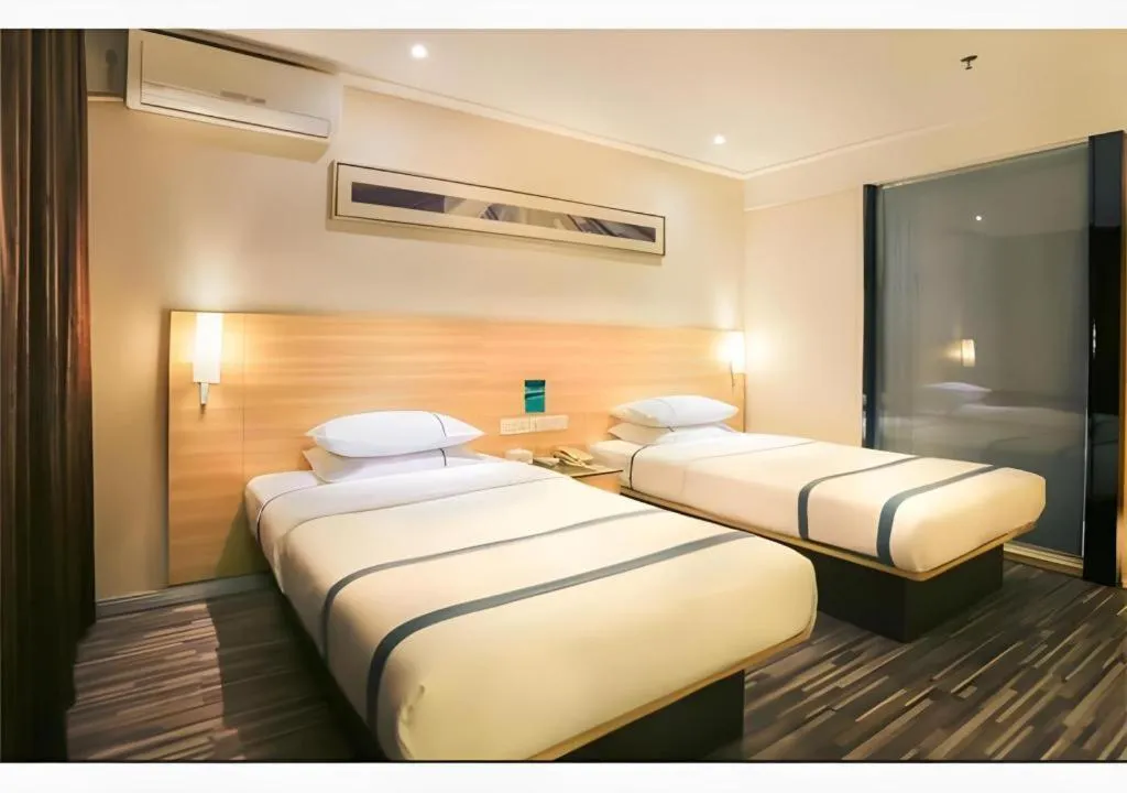 Bed in City Comfort Inn Nanning Normal University Mingxiu Metro Station