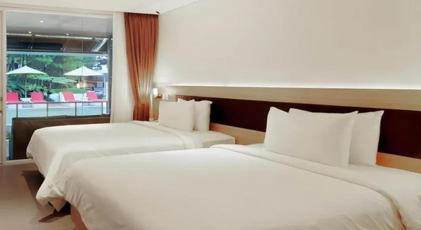 Bed in Bumi Bandhawa Hotel