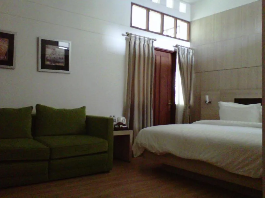 Bed in Bumi Bandhawa Hotel