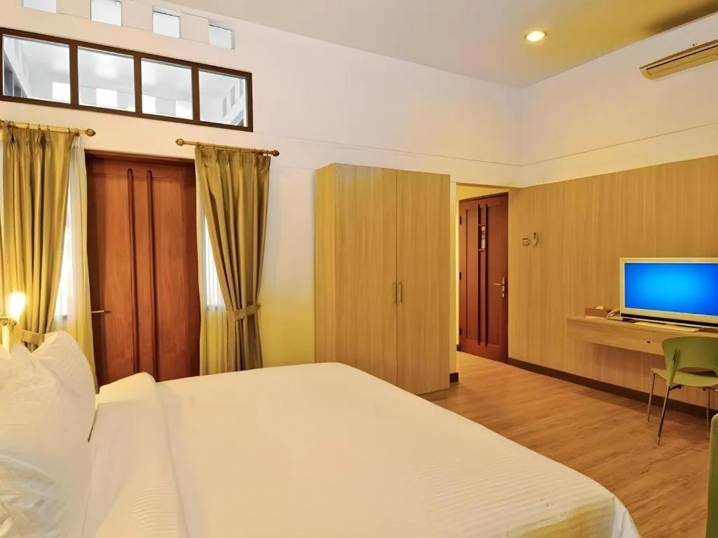 Bed in Bumi Bandhawa Hotel