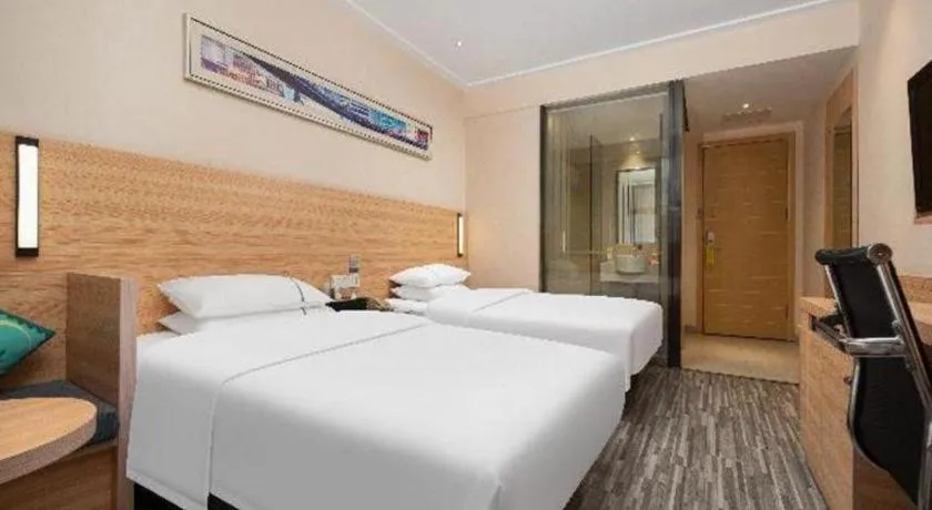 Bed in City Comfort Inn Zhuzhou Sports Center Red Star Macalline