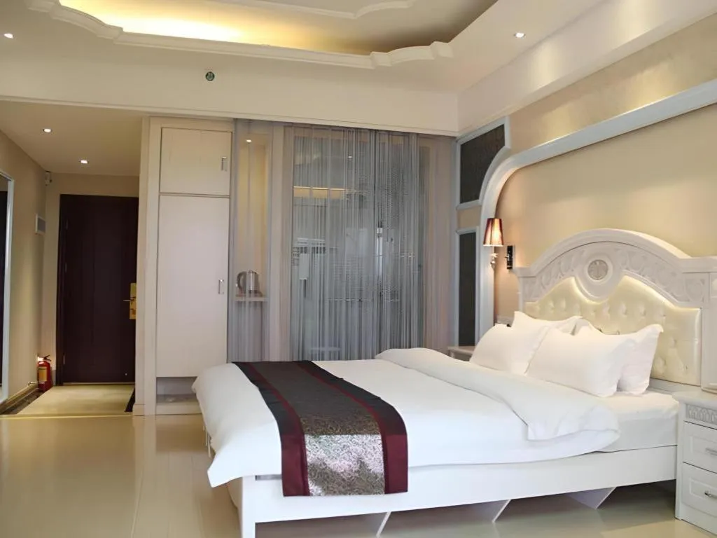 Bed in Chuanghui Business Hotel