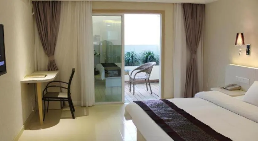 Bed in Chuanghui Business Hotel