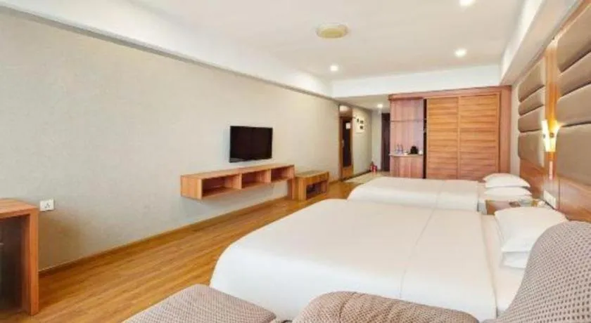 Bed in Chuanghui Business Hotel
