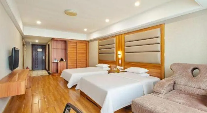 Bed in Chuanghui Business Hotel