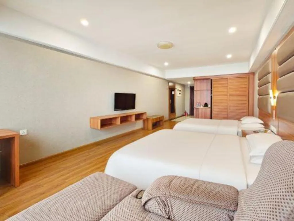 Bed in Chuanghui Business Hotel