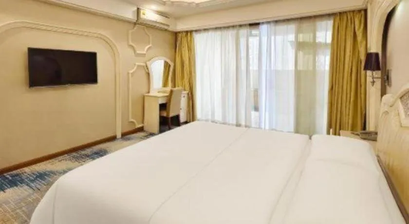Bed in Chuanghui Business Hotel
