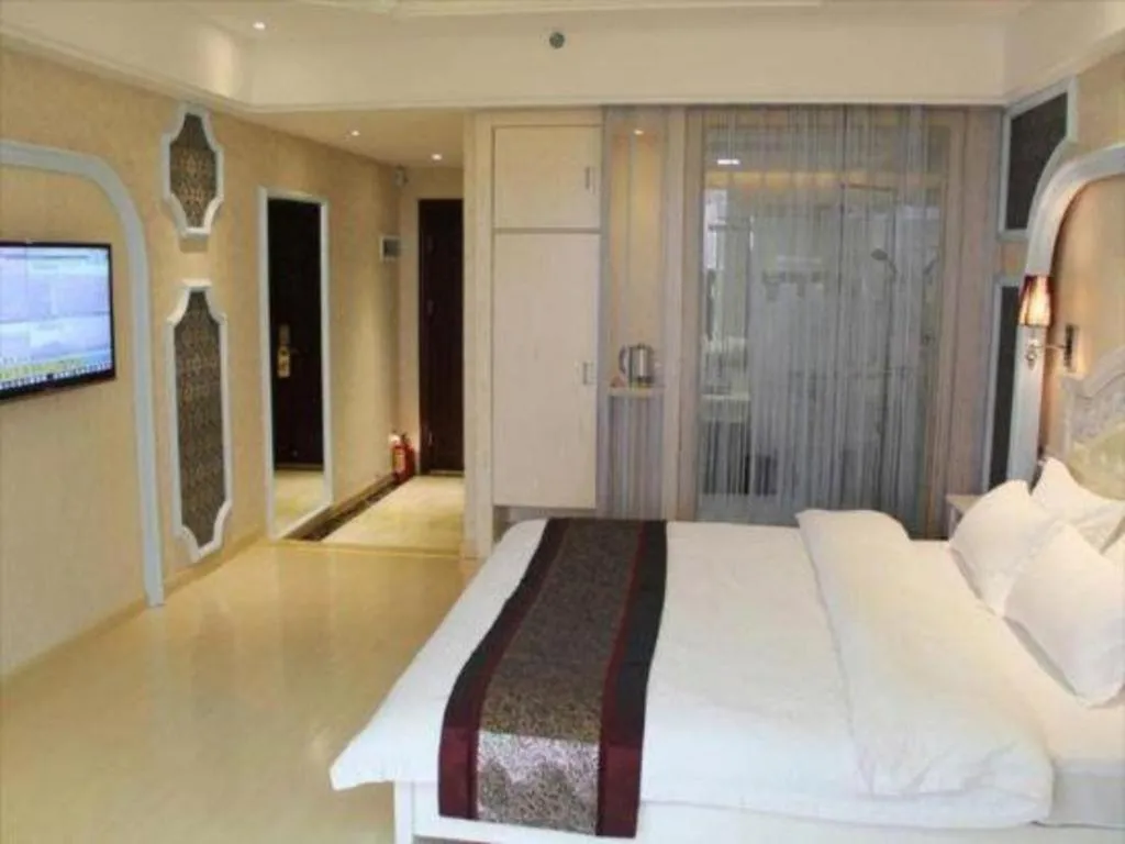 Bed in Chuanghui Business Hotel