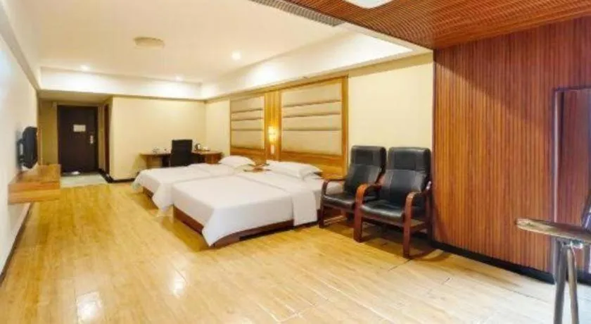 Bed in Chuanghui Business Hotel