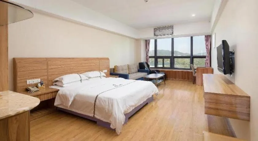 Bed in Chuanghui Business Hotel