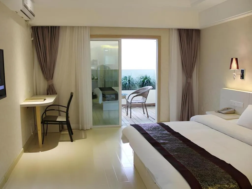 Bed in Chuanghui Business Hotel