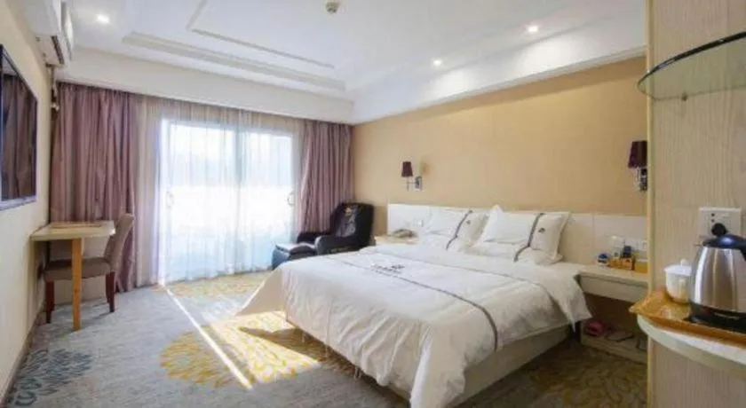 Bed in Chuanghui Business Hotel