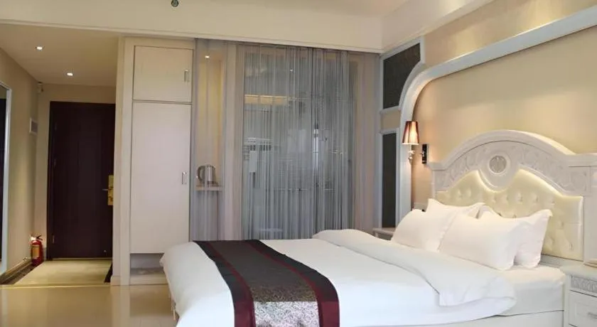 Bed in Chuanghui Business Hotel