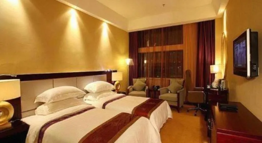 Bed in Chuanghui Business Hotel