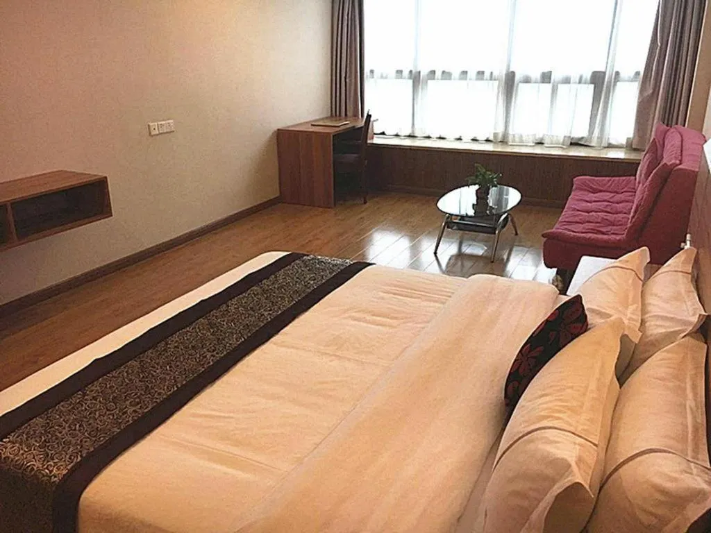 Bed in Chuanghui Business Hotel