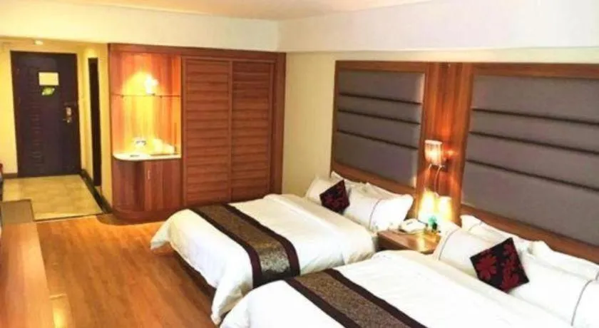 Bed in Chuanghui Business Hotel