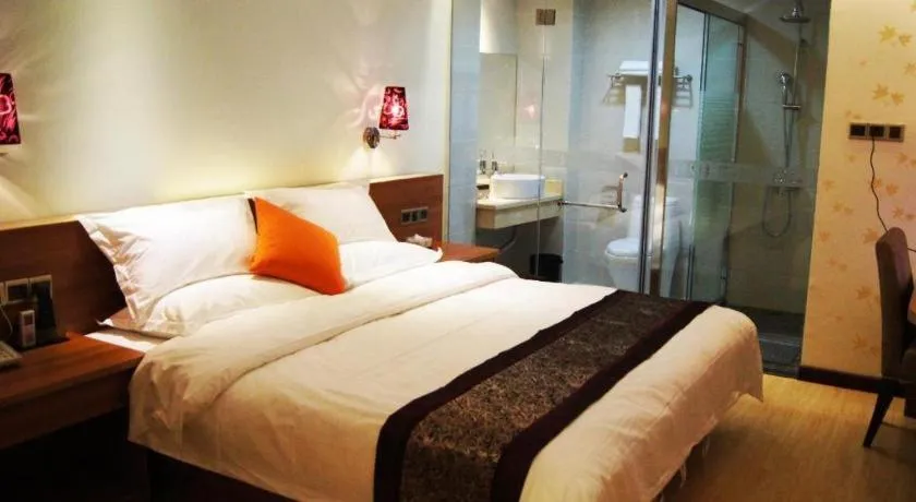 Bed in Chuanghui Business Hotel