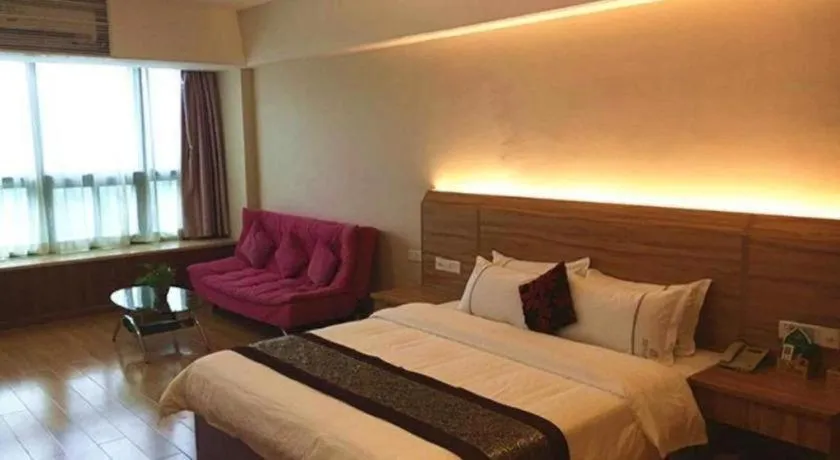 Bed in Chuanghui Business Hotel