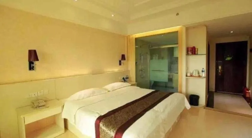 Bed in Chuanghui Business Hotel