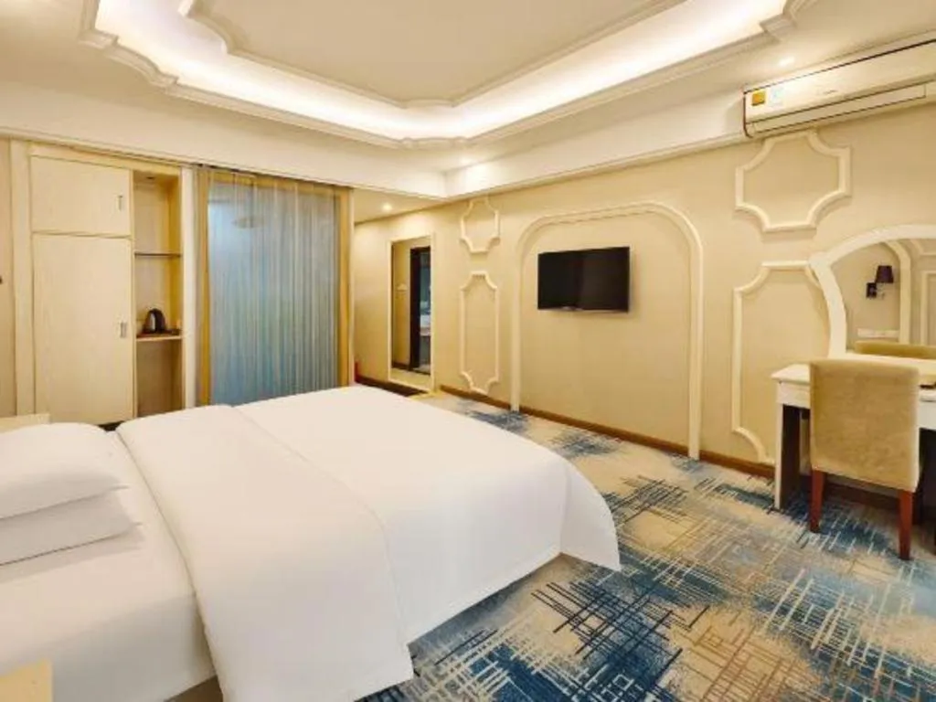 Bed in Chuanghui Business Hotel