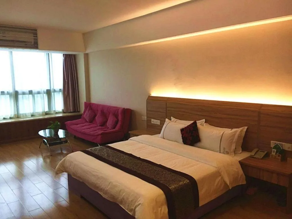 Bed in Chuanghui Business Hotel