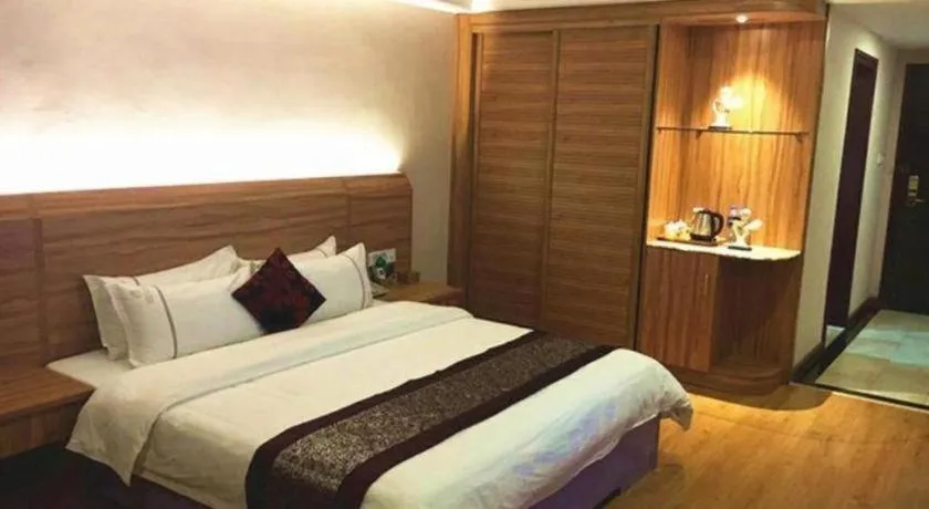 Bed in Chuanghui Business Hotel