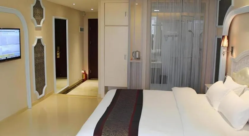 Bed in Chuanghui Business Hotel