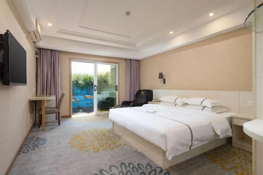 Bed in Chuanghui Business Hotel