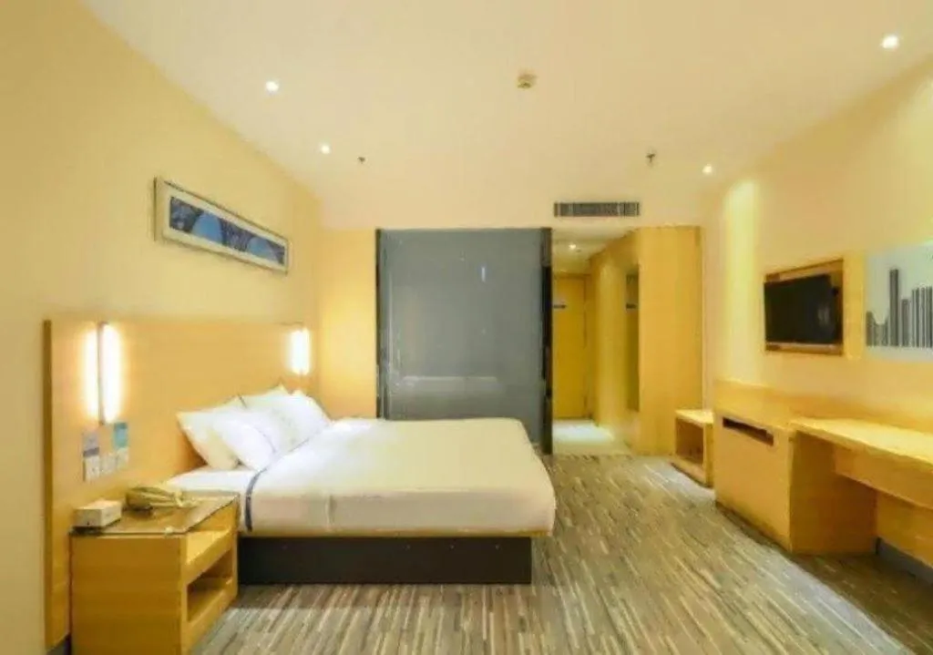 Bed in City Comfort Inn Jingzhou Ancient City Taiyue Road
