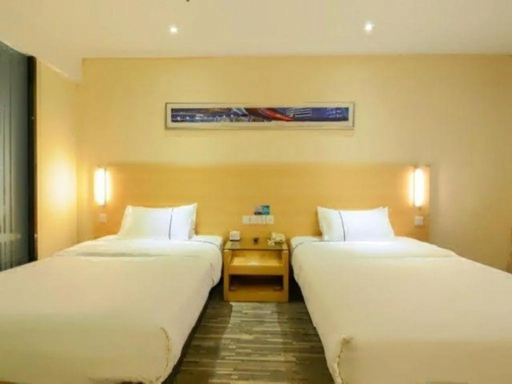 Bed in City Comfort Inn Jingzhou Ancient City Taiyue Road