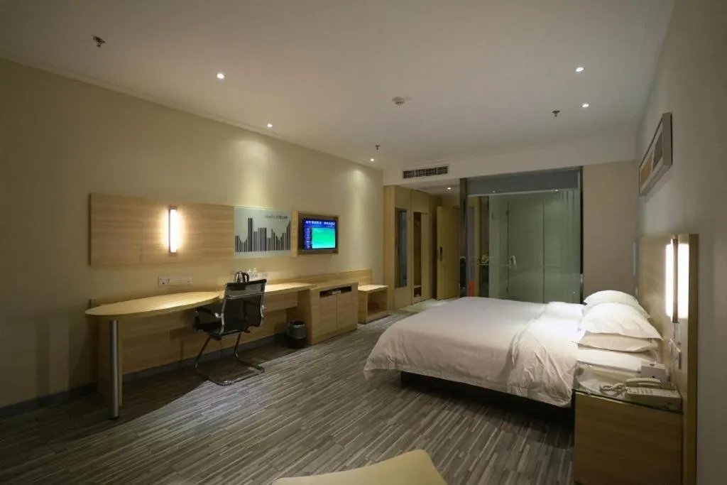 Bed in City Comfort Inn Jingzhou Ancient City Taiyue Road