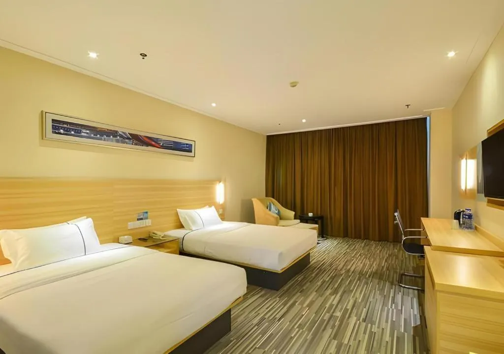 Bed in City Comfort Inn Jingzhou Ancient City Taiyue Road