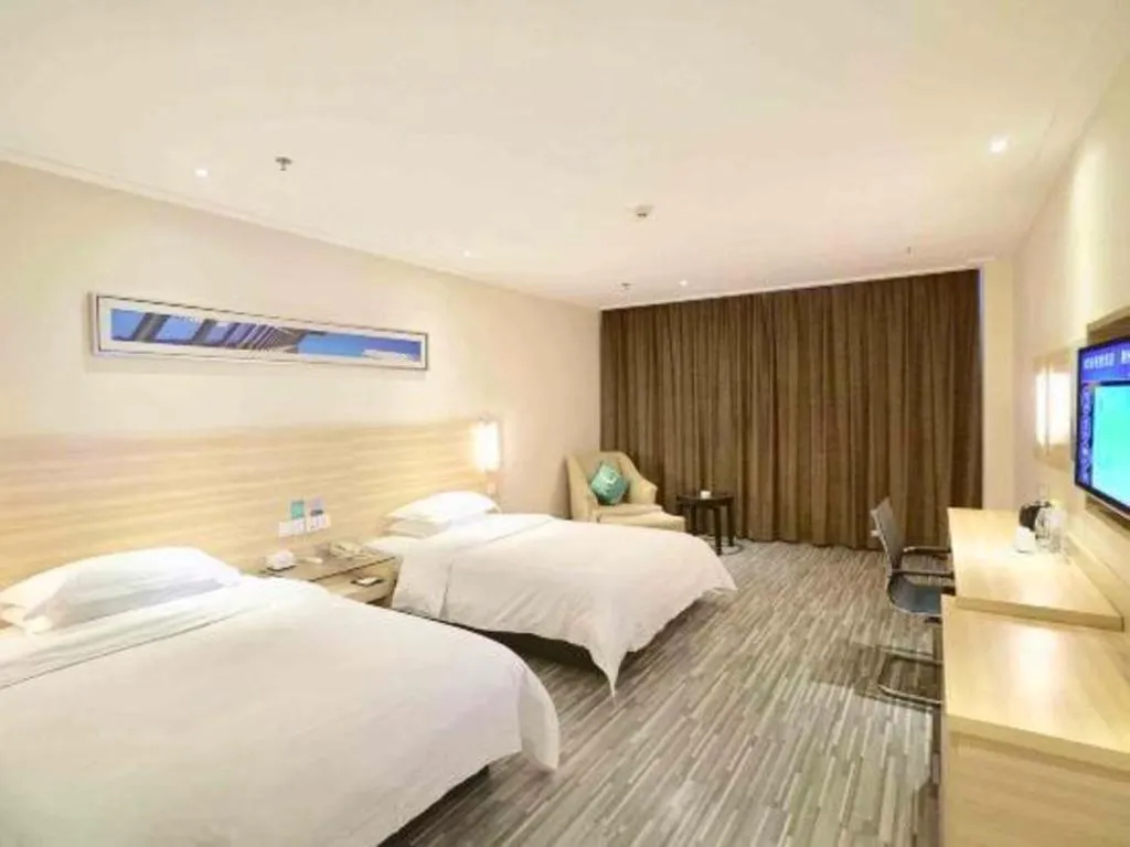 Bed in City Comfort Inn Jingzhou Ancient City Taiyue Road