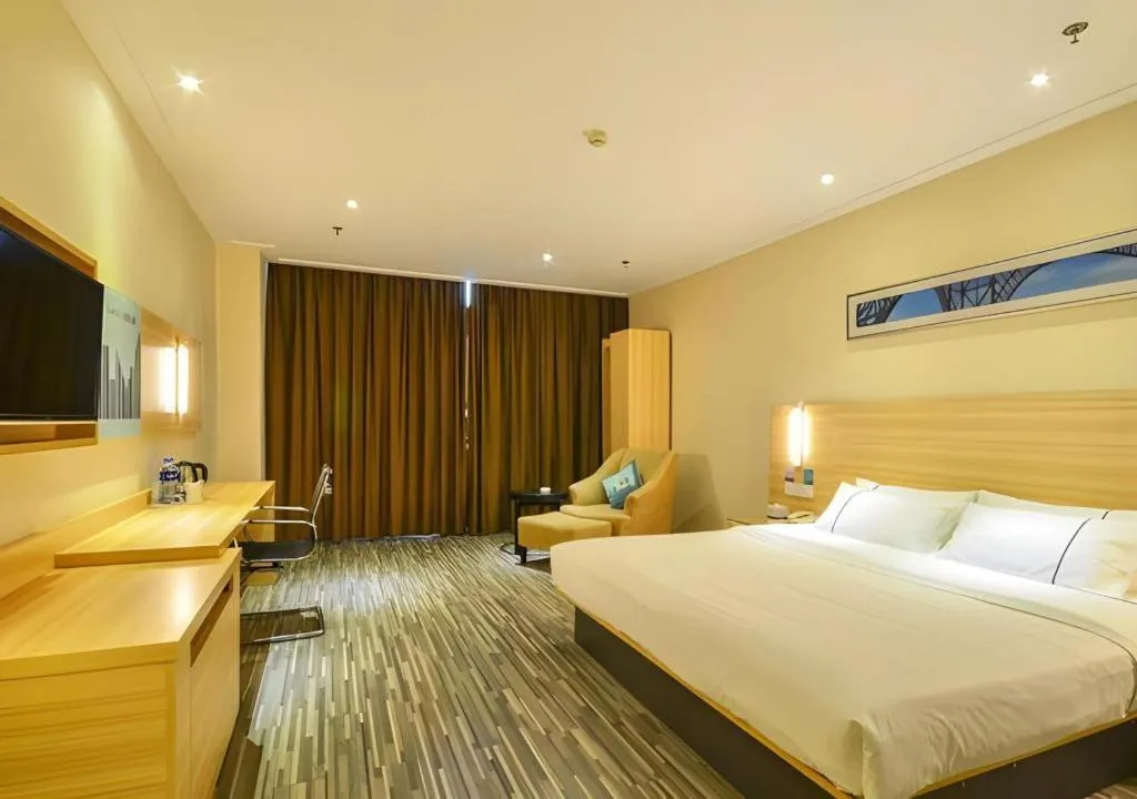 Bed in City Comfort Inn Jingzhou Ancient City Taiyue Road