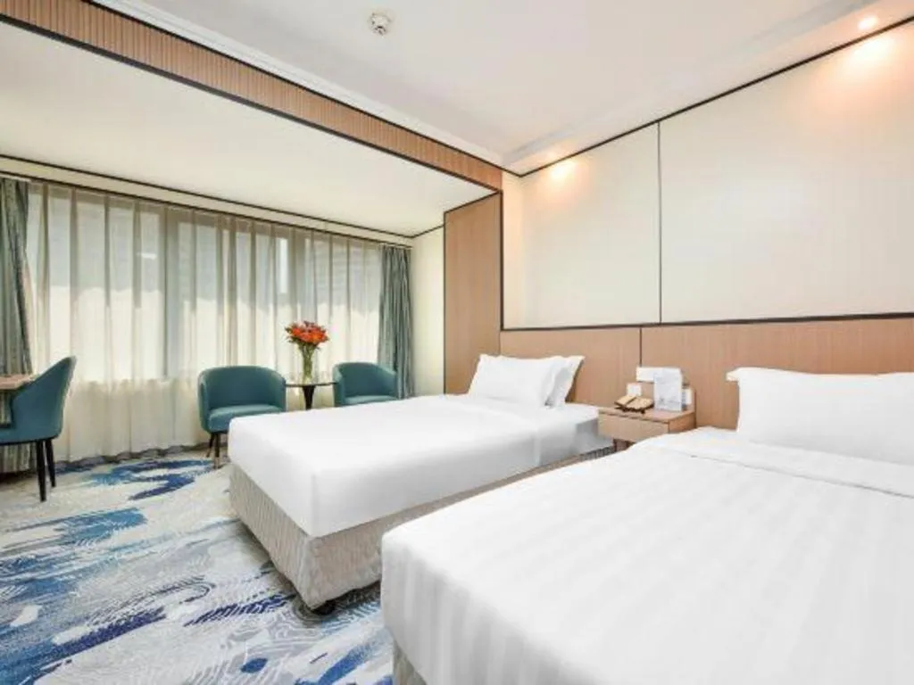 Bed in Dalian Bohai Pearl Hotel