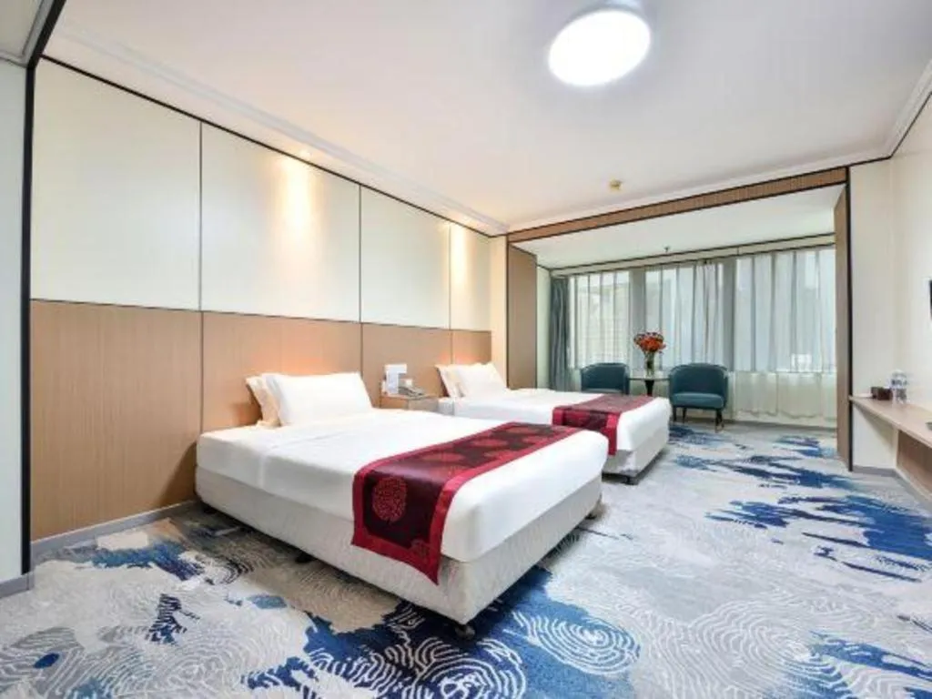 Bed in Dalian Bohai Pearl Hotel