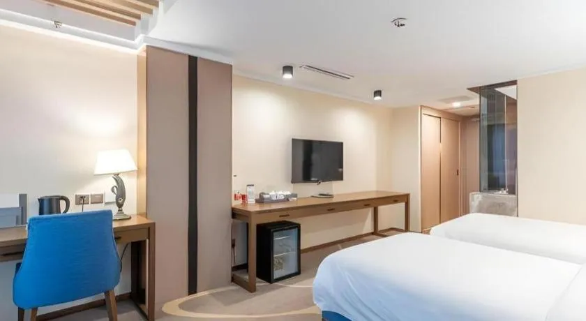 Bed in Dalian Bohai Pearl Hotel