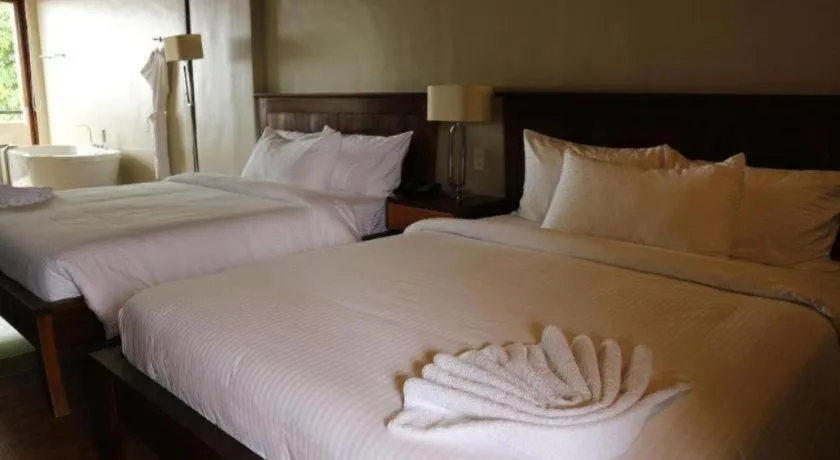 Bed in Bravo Resorts - Munting Paraiso