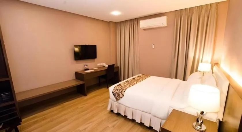 Bed in Oryza Hotel